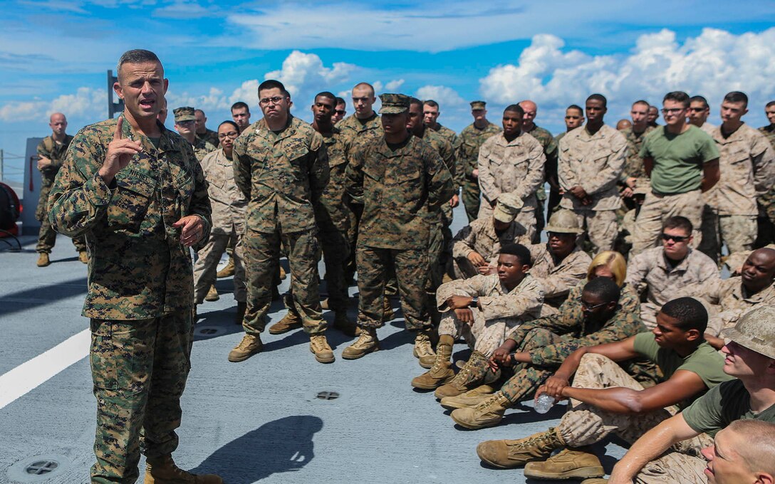 U.S. Marine Corps Col. Andrew M. Niebel, Commanding Officer, Headquarters Regiment, 2nd Marine Logistics Group, speaks to Marines and Sailors with 2nd Marine Logistics Group and 2nd Marine Air Wing during exercise Bold Alligator 16 aboard the SS Wright (T-AVB 3) in the Atlantic Ocean, Aug. 16, 2016. Bold Alligator is a joint service exercise held annually in order to ensure service members are capable of sustaining themselves while at sea.