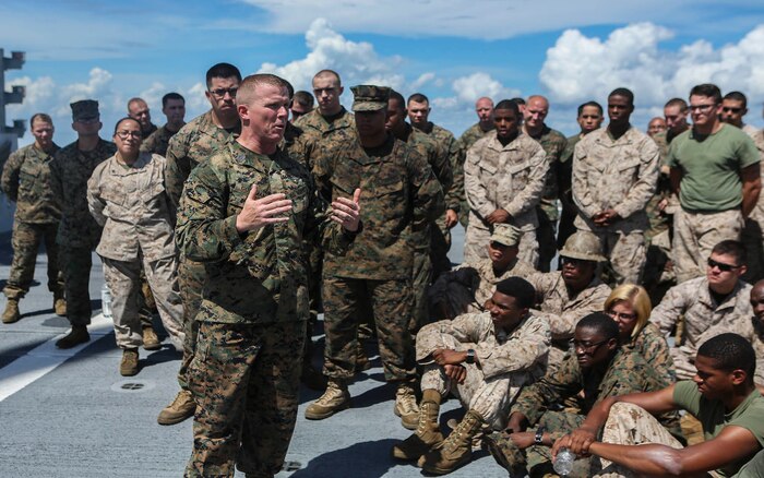 U.S. Marine Corps Sgt. Maj. Dylan W. Goldman, Sergeant Major, Headquarters Regiment, 2nd Marine Logistics Group, speaks to Marines and Sailors with 2nd Marine Logistics Group and 2nd Marine Air Wing during exercise Bold Alligator 16 aboard the SS Wright (T-AVB 3) in the Atlantic Ocean, Aug. 16, 2016. Bold Alligator is a joint service exercise held annually in order to ensure service members are capable of sustaining themselves while at sea.