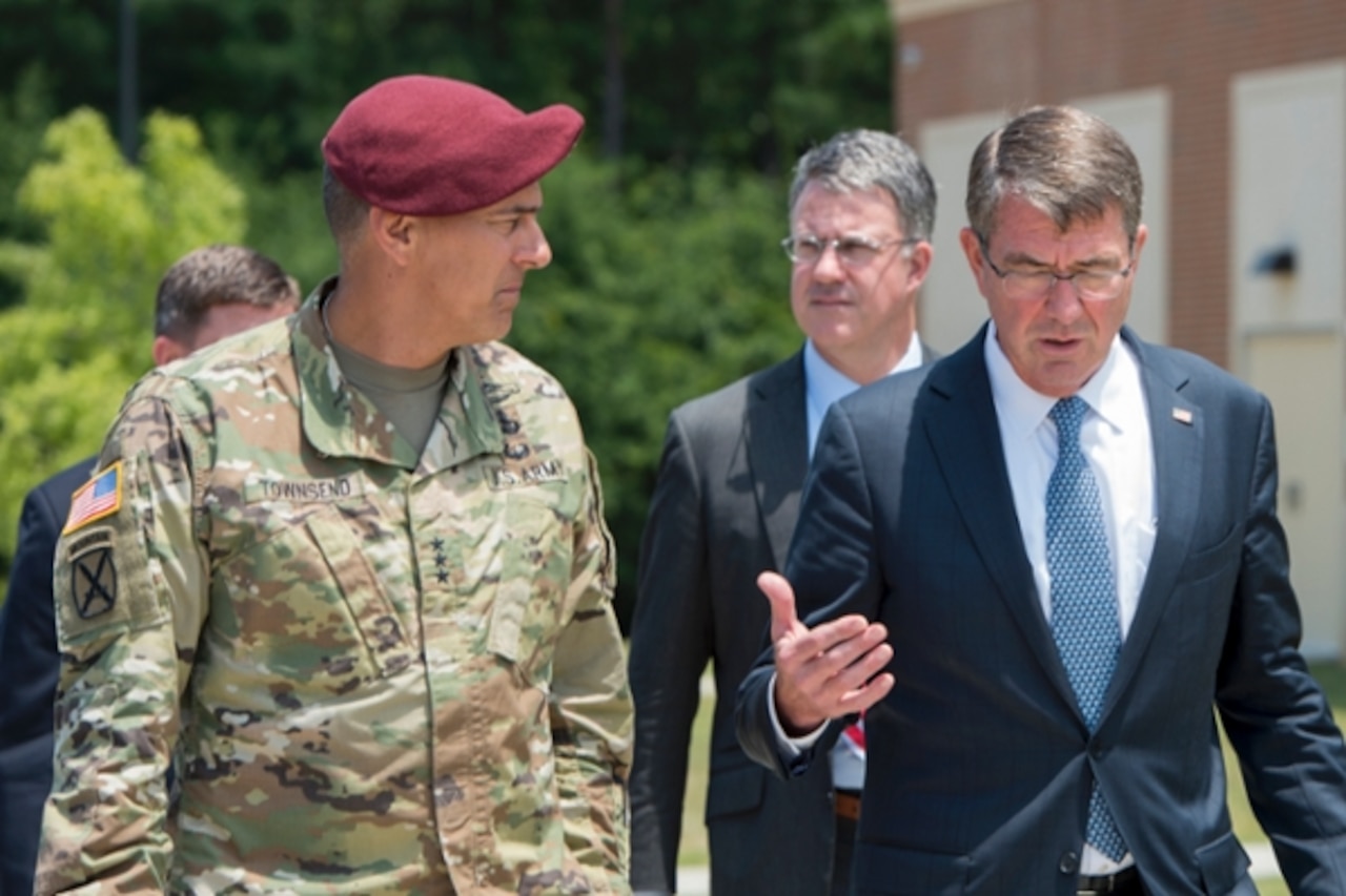 Defense Secretary Ash Carter speaks with Army Lt. Gen. Stephen J. Townsend, left, XVIII Airborne Corps commanding general, during a visit to Fort Bragg, N.C., July 27, 2016. Townsend became commander of Combined Joint Task Force-Operation Inherent Resolve during an Aug. 21, 2016, transfer of authority ceremony. DoD photo by Air Force Tech. Sgt. Brigitte N. Brantley
