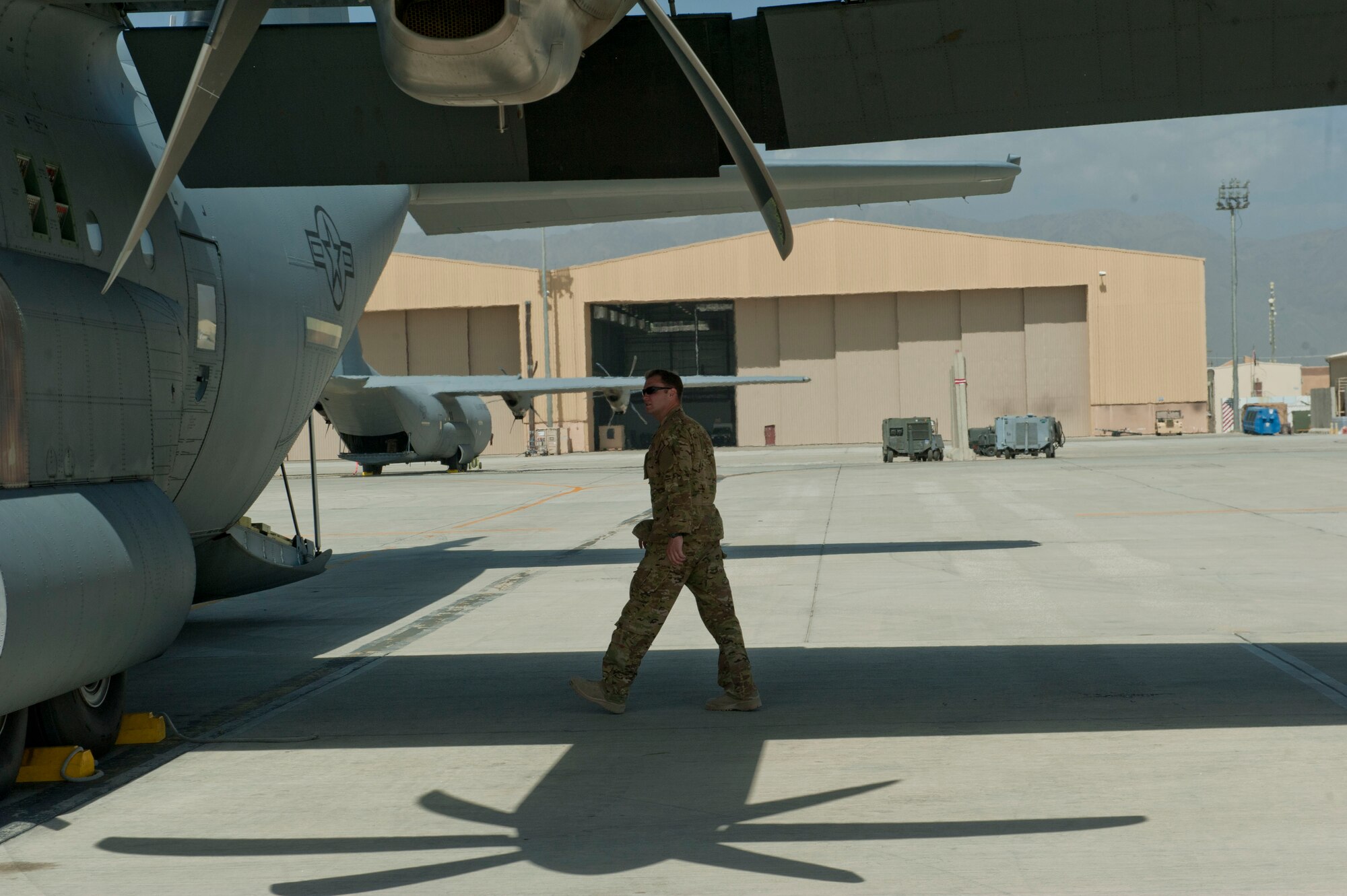 Capt. Andrew Campbell, 774th Expeditionary Airlift Squadron C-130J Super Hercules pilot, conducts a pre-flight inspection of the aircraft, Bagram Airfield, Afghanistan, Aug. 19, 2016. Campbell along with other Airmen from the 774th EAS were preparing to deliver cargo and fuel to Camp Dwyer, Afghanistan. (U.S. Air Force photo by Capt. Korey Fratini)