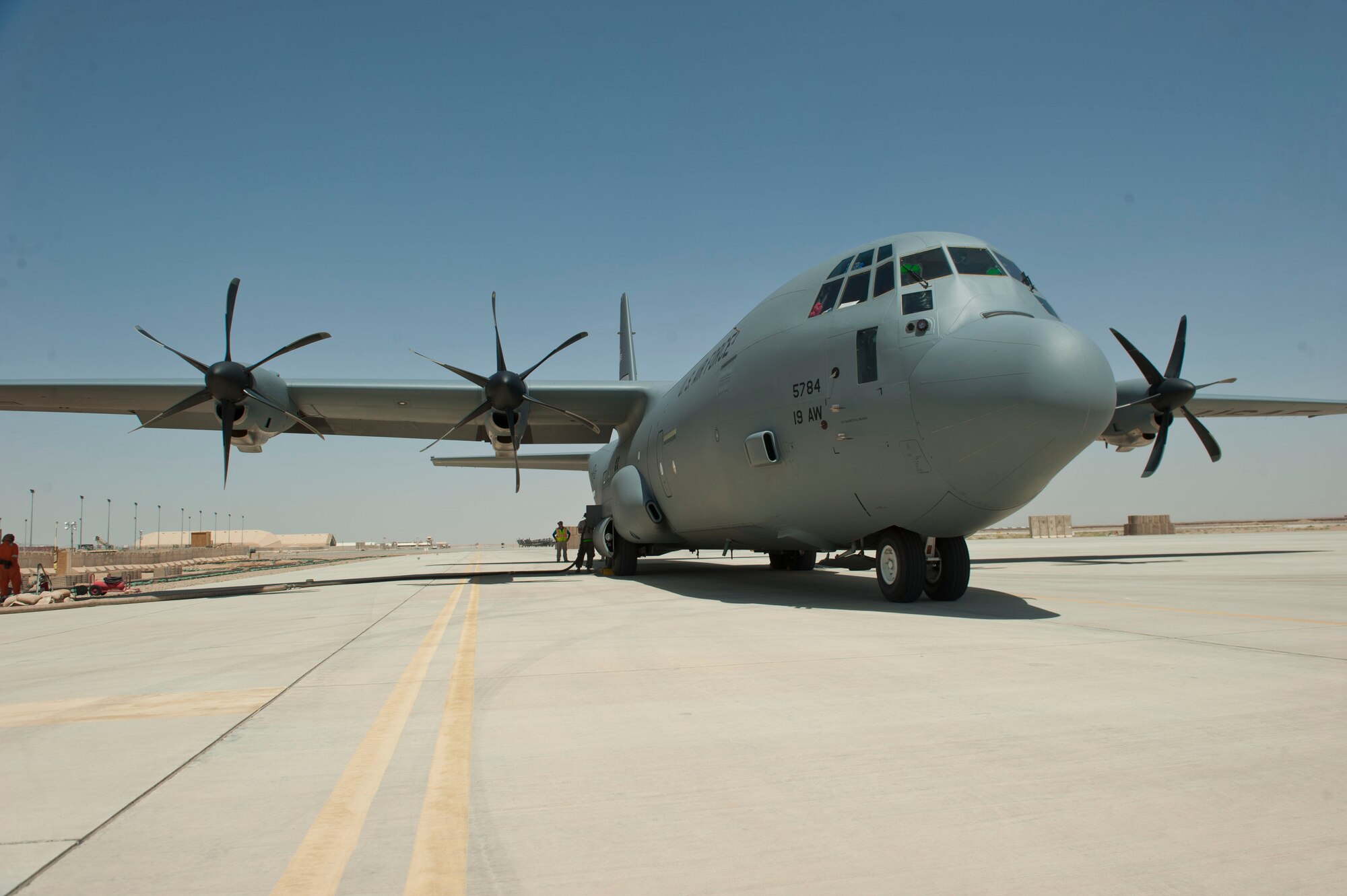 A C-130J Super Hercules from the 774th Expeditionary Airlift Squadron sits on the ramp at Camp Dwyer, Afghanistan while fuel is being offloaded Aug. 19, 2016. In addition to cargo and personnel, the C-130J has the capability to
deliver and offload fuel when needed to locations across the globe. (U.S. Air Force photo by Capt. Korey Fratini)