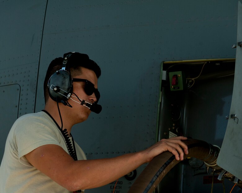Staff Sgt. Patrick Brennan, 455th Expeditionary Aircraft Maintenance Squadron crew chief, ensures a fuel hose is properly connected prior to fuel being offloaded from a C-130J Super Hercules, Camp Dwyer, Afghanistan, Aug. 19,
2016. Brennan monitored the aircraft to ensure that the fuel was safely being offloaded to storage tanks. (U.S. Air Force photo by Capt. Korey Fratini)