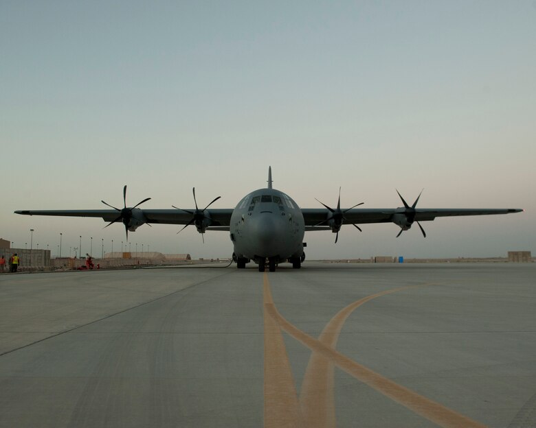 A C-130J Super Hercules from the 774th Expeditionary Airlift Squadron sits on the ramp at Camp Dwyer, Afghanistan while fuel is being offloaded Aug. 19, 2016. In addition to cargo and personnel, the C-130J has the capability to
deliver and offload fuel when needed to locations across the globe. (U.S. Air Force photo by Capt. Korey Fratini)