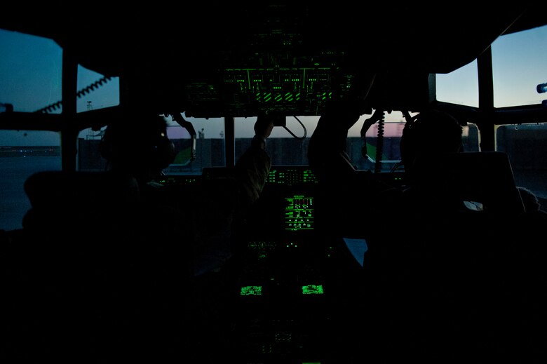 Two C-130J Super Hercules pilots from the 774th Expeditionary Airlift Squadron conduct pre-flight operations prior to takeoff Dwyer Airfield, Afghanistan, Aug. 19, 2016. In addition to carrying cargo and personnel, the C-130J is able
to offload fuel into storage tanks at locations across the globes. (U.S. Air Force photo by Capt. Korey Fratini)