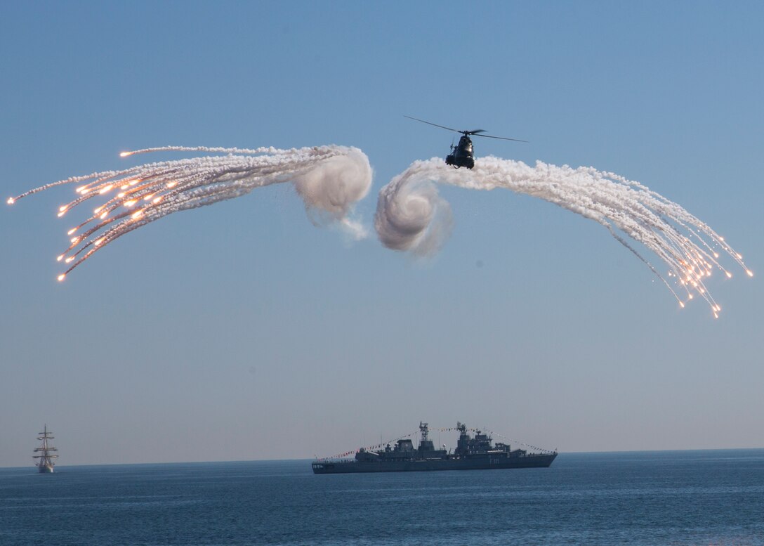 The Romanian navy demonstrates its power during the 114th annual Navy Day celebration at the Port of Constanţa, Romania, Aug. 15, 2016. U.S. Sailors and Marines supporting the Black Sea Rotational Force 16.2 helped pay tribute to the prestigious history of the Romanian navy and highlighted the military’s movement toward new developments and modernizations. Black Sea Rotational Force is an annual multilateral security cooperation activity between the U.S. Marine Corps and partner nations in the Black Sea, Balkan and Caucasus regions designed to enhance participants’ collective professional military capacity, promote regional stability and build enduring relationships with partner nations. (U.S. Marine Corps photo by Sgt. Michelle Reif)
