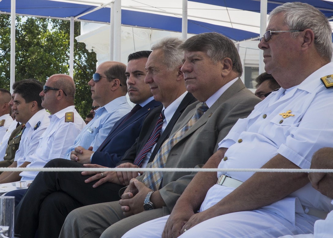U.S. Ambassador to Romania Hans Klemm, third from the right, watches the festivities during the 114th annual Navy Day celebration at the Port of Constanţa, Romania, Aug. 15, 2016. U.S. Sailors and Marines supporting the Black Sea Rotational Force 16.2 helped pay tribute to the prestigious history of the Romanian navy and highlighted the military’s movement toward new developments and modernizations. Black Sea Rotational Force is an annual multilateral security cooperation activity between the U.S. Marine Corps and partner nations in the Black Sea, Balkan and Caucasus regions designed to enhance participants’ collective professional military capacity, promote regional stability and build enduring relationships with partner nations. (U.S. Marine Corps photo by Sgt. Michelle Reif)