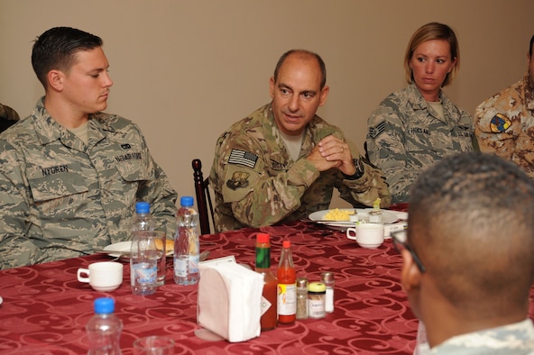 Lt. Gen. Jeffrey Harrigian, U.S. Air Forces Central Command commander, speaks to airmen of the 386th Air Expeditionary Wing after breakfast Aug. 21, 2016, at an undisclosed location in Southwest Asia. Harrigian made his first visit to the base after taking command of AFCENT last month. (U.S. Air Force photo/Senior Airman Zachary Kee)