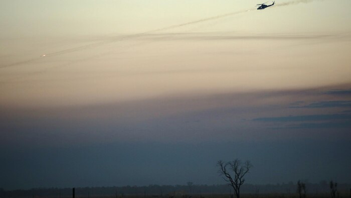 A UH-1Y Venom helicopter with Marine Light Attack Helicopter Squadron 367 provides close air support for Marines on the ground during a live fire range August 18, 2016 at Bradshaw Field Training Area, Northern Territory, Australia. The range was the final training evolution of Exercise Koolendong 16, a trilateral exercise between the U.S. Marine Corps, Australian Defence Force and French Armed Forces New Caledonia.