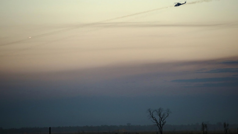 A UH-1Y Venom helicopter with Marine Light Attack Helicopter Squadron 367 provides close air support for Marines on the ground during a live fire range August 18, 2016 at Bradshaw Field Training Area, Northern Territory, Australia. The range was the final training evolution of Exercise Koolendong 16, a trilateral exercise between the U.S. Marine Corps, Australian Defence Force and French Armed Forces New Caledonia.