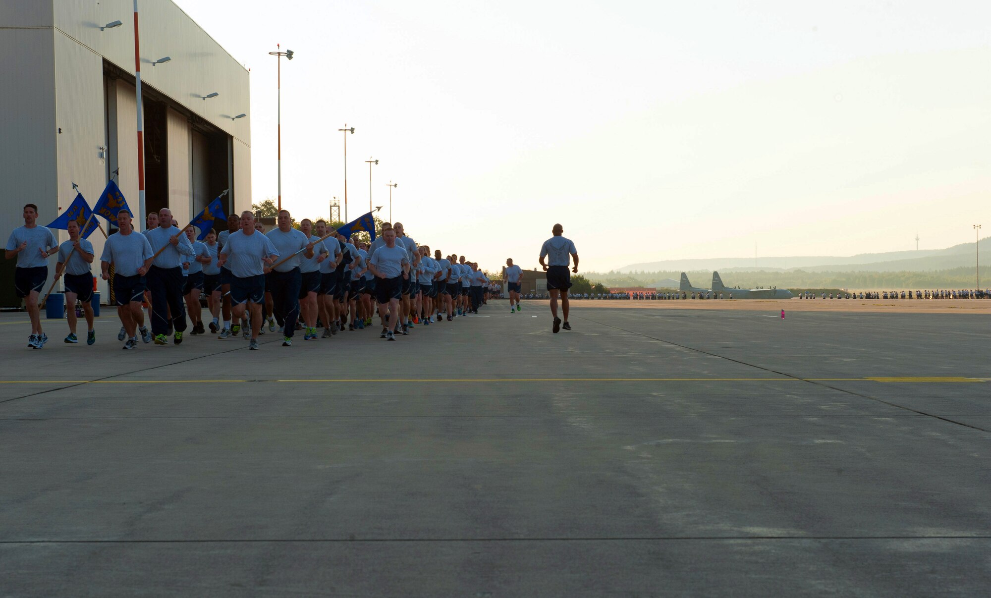 Airmen from the 86th Comptroller Squadron participate in a tri-wing run Aug. 18, 2016, at Ramstein Air Base, Germany. The 1.8 mile event focused on boosting morale and strengthening cohesion within the units. (U.S. Air Force photo/Staff Sgt. Sharida Jackson)