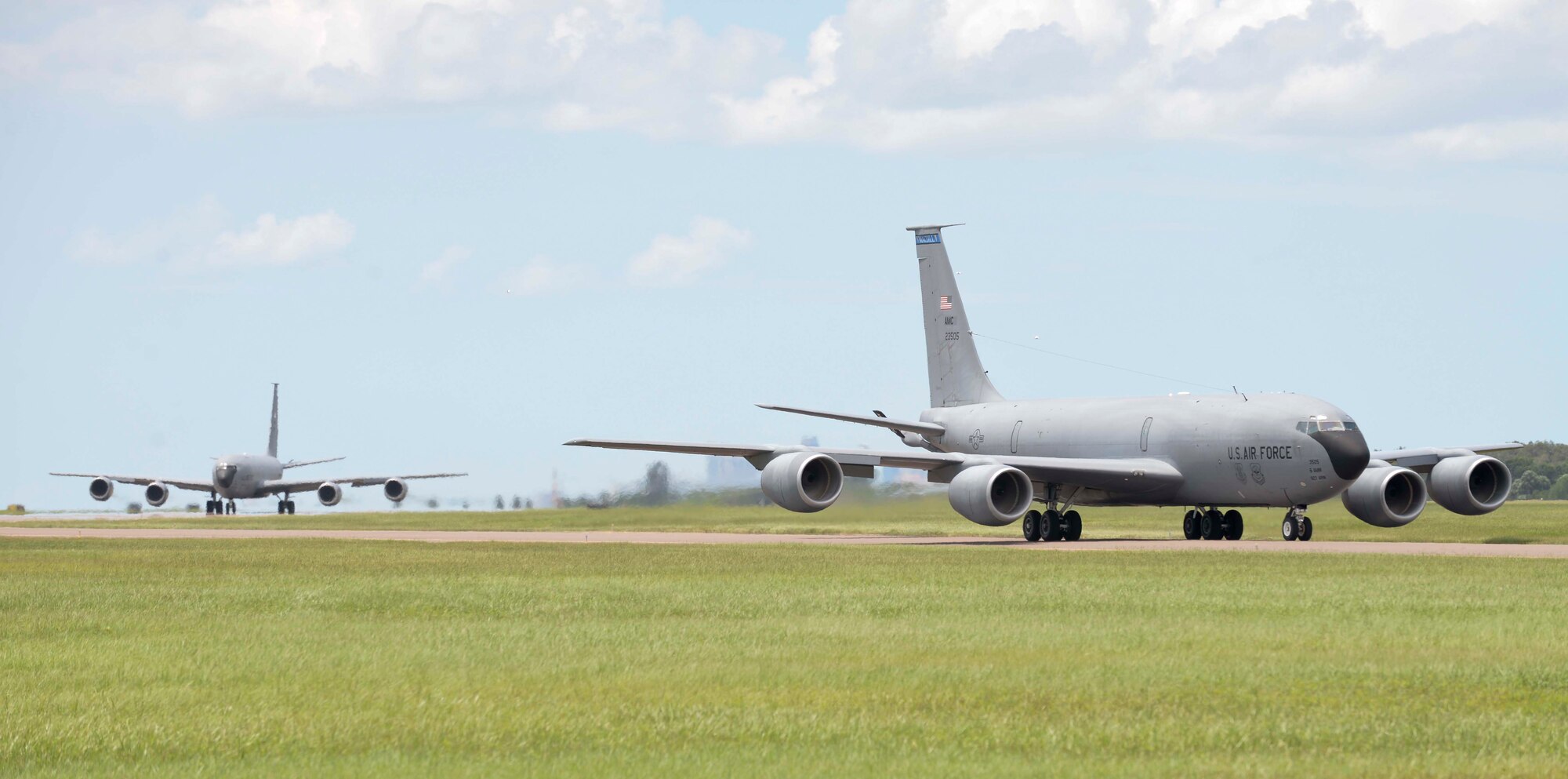 Two KC-135 Stratotankers taxi down the runway during a generation exercise at MacDill Air Force Base, Fla., Aug. 17, 2016. A generation exercise is performed to ensure that all facets of the 6th Air Mobility Wing are mission ready at a moment’s notice. (U.S. Air Force photo by Senior Airman Vernon L. Fowler Jr.)