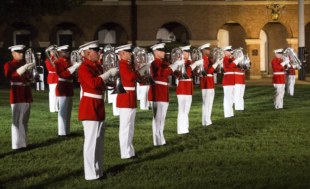 The United States Marine Drum & Bugle Corps perform during the Noncommissioned Officer's Parade at Marine Barracks Washington, D.C., Aug. 19, 2016. The guest of honor for the parade was Adm. John M. Richardson, chief of Naval Operations and the hosting official was Gen. Robert B. Neller, commandant of the Marine Corps. (Official Marine Corps photo by Lance Cpl. Robert Knapp/Released)