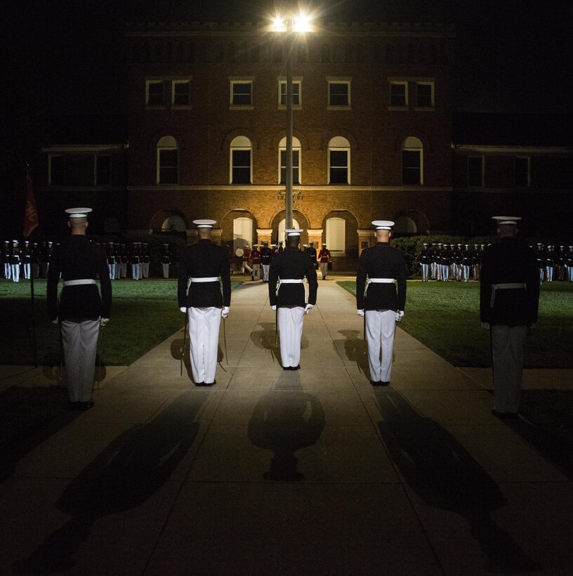 Marines of Marine Barracks Washington, D.C., perform during the Noncommissioned Officer's Parade, Aug. 19, 2016. The guest of honor for the parade was Adm. John M. Richardson, chief of Naval Operations and the hosting official was Gen. Robert B. Neller, commandant of the Marine Corps. (Official Marine Corps photo by Lance Cpl. Robert Knapp/Released)