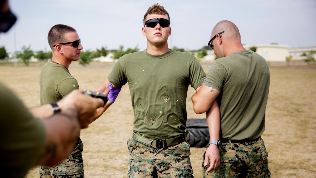 U.S. Marine Corps Cpl. Luke Handwerger is hit with the X-26E Taser as a part of the non-lethal weapons training at Mihail Kogalniceanu Air Base, Romania, Aug. 18, 2016. The BSRF is a rotational deployment to the Black Sea, Balkan and Caucasus regions designed to enhance participants’ collective professional military capacity, promote regional stability and build enduring relationships with partner nations.
