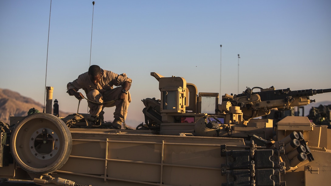 U.S. Marine Corps Lance Cpl. Markis Woods, a tank loader with Detla Company, 1st Tank Battalion, 1st Marine Division checks over ammunition before conducting offensive and defensive tactics during Large Scale Exercise at Marine Corps Air Ground Combat Center, Calif., Aug. 17, 2016. LSE-16 is designed to enhance the command and control, and interoperability between I Marine Expeditionary Force and its higher, adjacent and subordinate command headquarters.
