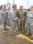 General Joseph L Lengyel, chief of the National Guard Bureau, shakes the hands of Louisiana National Guard members participating in emergency flood operations in Baton Rouge on Aug. 12, 2016. Baton Rouge