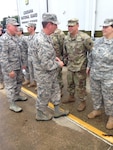 General Joseph L Lengyel, chief of the National Guard Bureau, shakes the hands of Louisiana National Guard members participating in emergency flood operations in Baton Rouge on Aug. 12, 2016. Baton Rouge