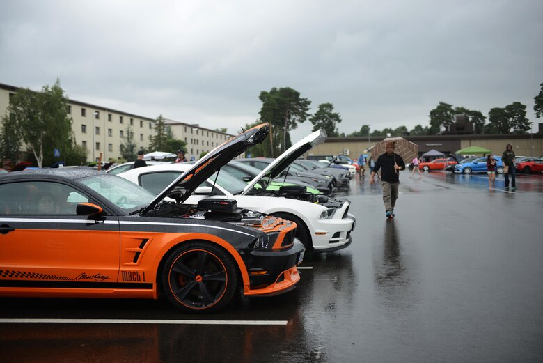 Participants and spectators attend the 86th Vehicle Readiness Squadron Auto Show Aug. 20, 2016, at Ramstein Air Base, Germany. Approximately 180 participants from the Kaiserslautern Military Community and Europe participated in the event. (U.S. Air Force photo/ Airman 1st Class Joshua Magbanua)