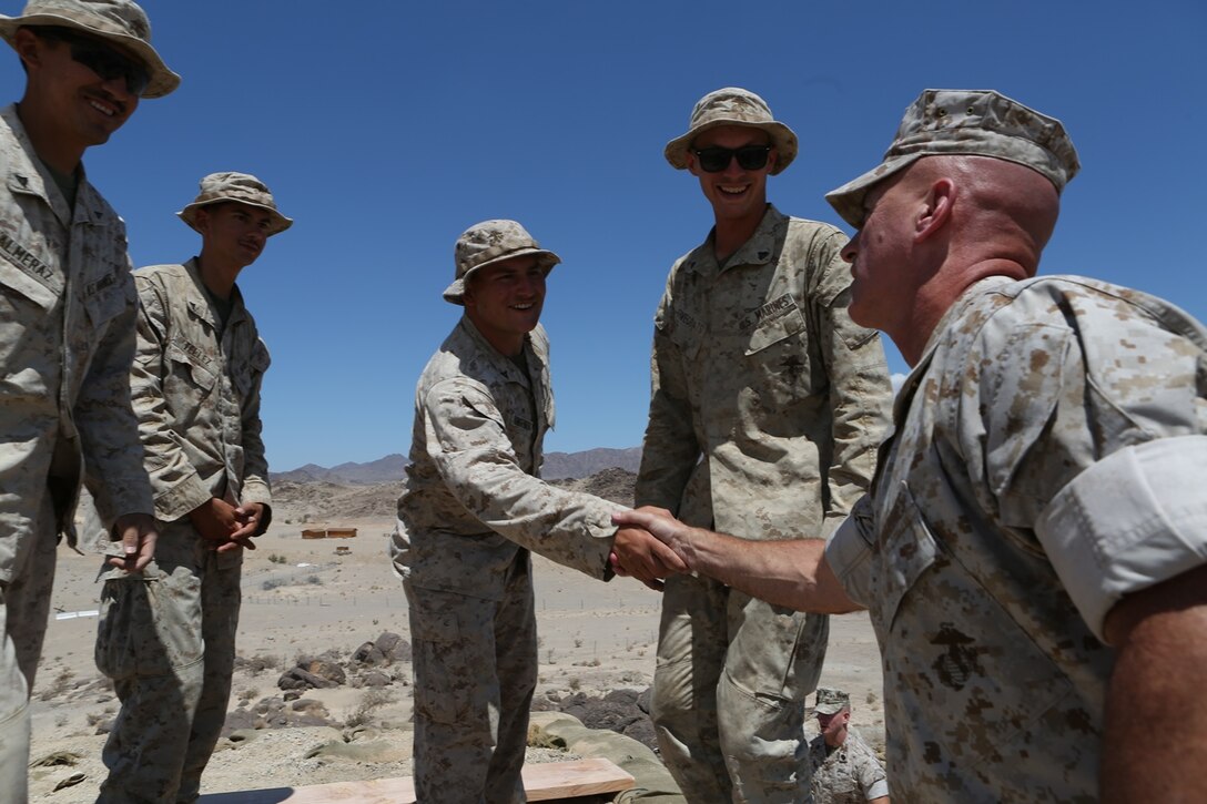 U.S. Marine Brig. Gen. David A. Ottignon speaks to Combat Logistics Battalion 7, Combat Logistics Regiment 1, 1st Marine Logistics Group Marines participating in Integrated Training Exercise 5-16 at Marine Corps Air Ground Combat Center Twentynine Palms, Calif. Aug. 12, 2016. Ottignon is the MLG commanding general. The MLG commanding general, sergeant major, and command master chief visited the combat center to speak with unit commanders as well as engage junior Marines and non-commissioned officers to get a sense of how MLG units are doing and what areas could be improved upon. (U.S. Marine Corps photo by Sgt. Carson Gramley/released)
