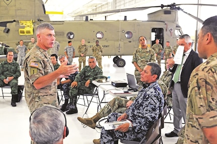 Maj. Gen. Wayne W. Grigsby Jr., commanding general of the 1st Infantry Division and Fort Riley, provides an overview of 1st Combat Aviation Brigade, 1st Inf. Div., capabilities to the Fifth Army Inter-American Relations Program delegation July 21 at Fort Riley. “FIARP is an annual Headquarters, Department of the Army-funded weeklong program established after World War II. The goal of the program is to enhance Army-to-army relations, increase interoperability and exchange ideas.