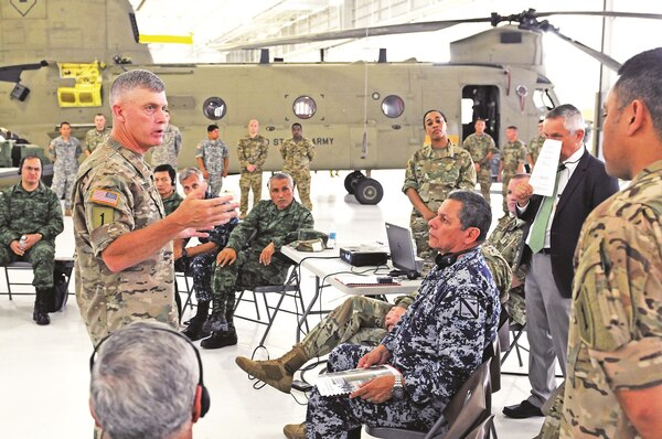 Maj. Gen. Wayne W. Grigsby Jr., commanding general of the 1st Infantry Division and Fort Riley, provides an overview of 1st Combat Aviation Brigade, 1st Inf. Div., capabilities to the Fifth Army Inter-American Relations Program delegation July 21 at Fort Riley. “FIARP is an annual Headquarters, Department of the Army-funded weeklong program established after World War II. The goal of the program is to enhance Army-to-army relations, increase interoperability and exchange ideas.