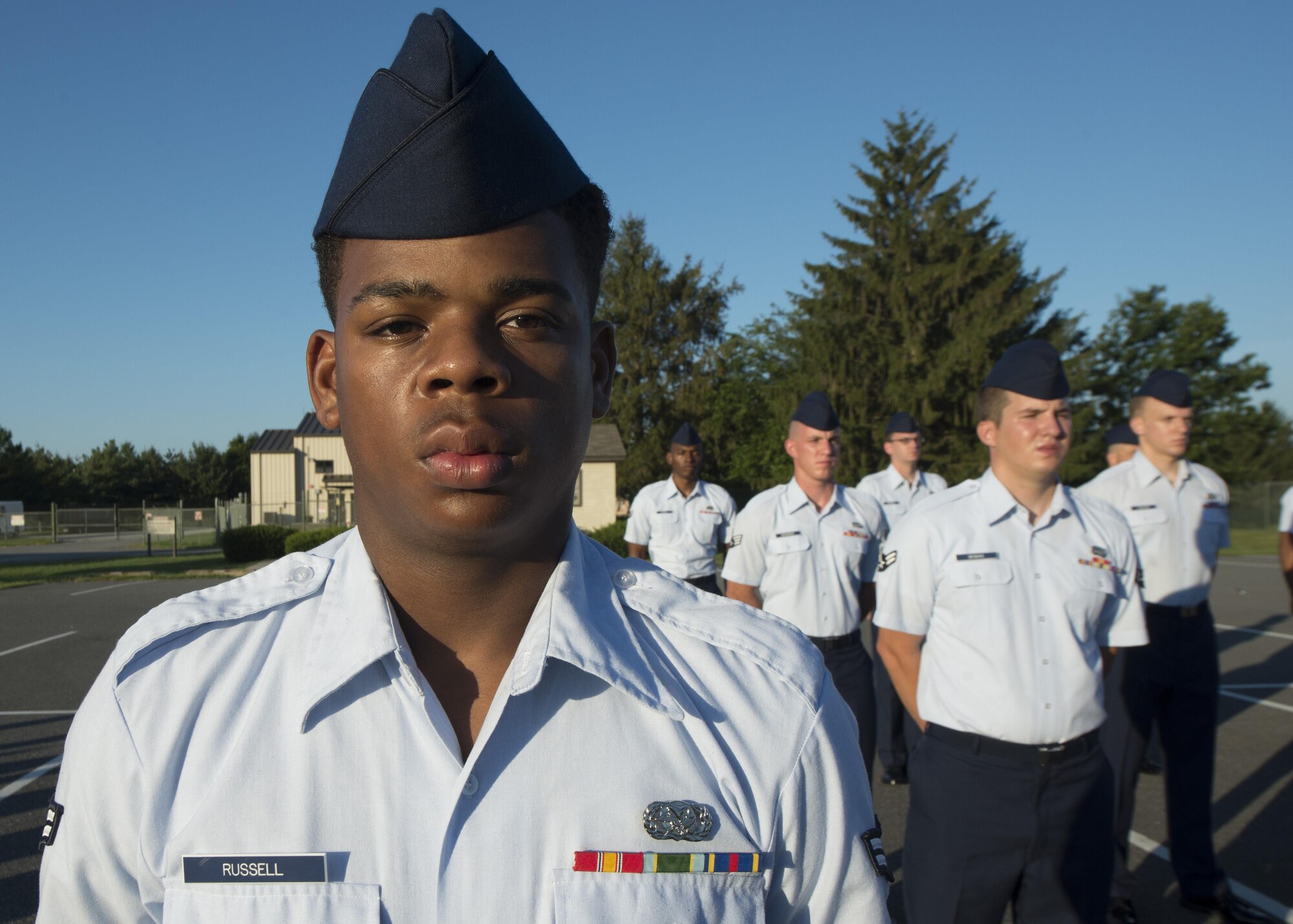 Airman 1st Class Dimitrios Russell, 436th Logistics Readiness Squadron fuels operator, stands at parade rest during an open-ranks inspection Aug. 17, 2016, on Dover Air Force Base, Del. The 436th LRS plans for emergency response deployments, combat support capability, and base and expeditionary support. (U.S. Air Force photo/Senior Airman Zachary Cacicia)