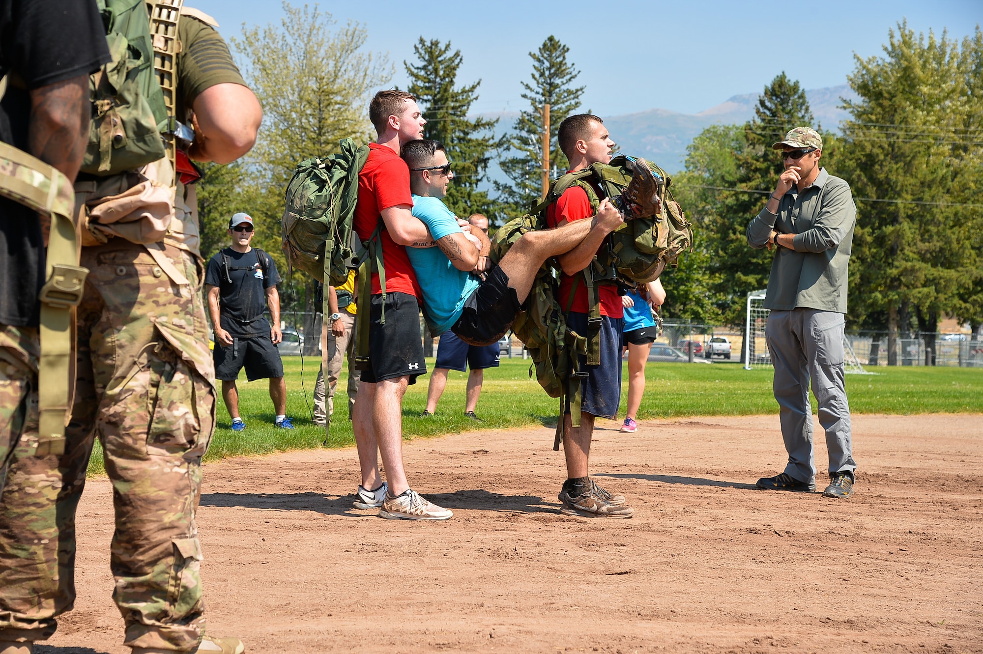 GoRuck participants demonstrate team cohesion during a challenge exercise at Hill Air Force Base, Utah, Aug. 19, 2016. (U.S. Air Force photo by R. Nial Bradshaw)