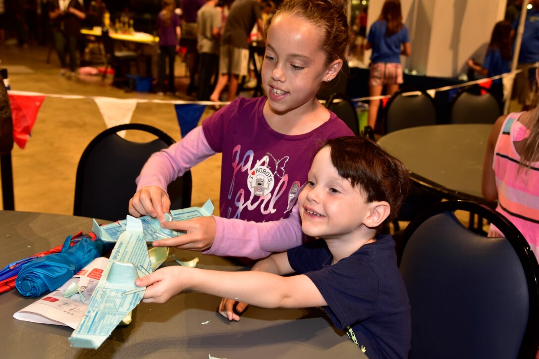 DAYTON, Ohio -- Youth participate in aerospace demonstration stations during Family Day on Aug. 20, 2016, at the National Museum of the U.S. Air Force. (U.S. Air Force photo) 