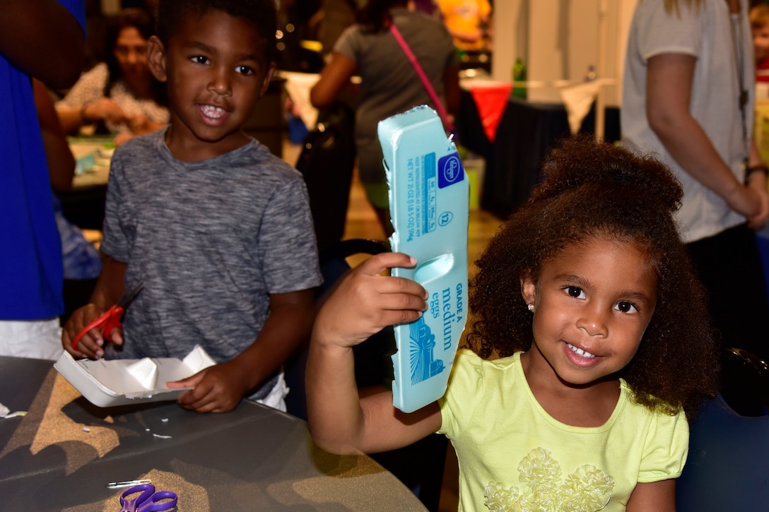 DAYTON, Ohio -- Youth participate in aerospace demonstration stations during Family Day on Aug. 20, 2016, at the National Museum of the U.S. Air Force. (U.S. Air Force photo) 