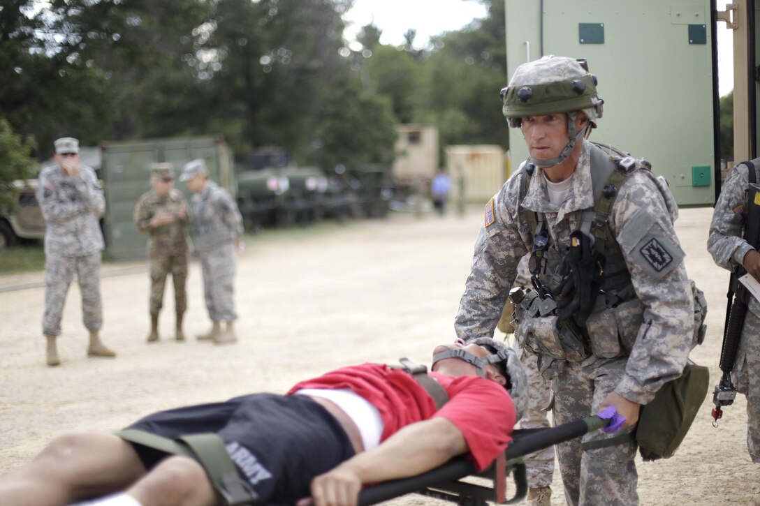 U.S. Army Reserve Soldiers train for Combat Casualty Care at Forward Operating Base Justice on Fort McCoy, Wis. on August 18, 2016. Nearly 7,000 service members from across the country are participating in the 86th Training Division's Combat Support Training Exercise at Fort McCoy, Wis. More than 100 units from across the Army, the Air Force, the Navy, the Marines, and the Canadian Army are training at the 84th Training Command's final exercise of 2016. (U.S. Army Photo by Sgt. Tierney P. Curry/Released)