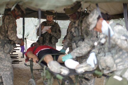 U.S. Army Reserve Soldiers train for Combat Casualty Care at Forward Operating Base Justice on Fort McCoy, Wis. on August 18, 2016. Nearly 7,000 service members from across the country are participating in the 86th Training Division's Combat Support Training Exercise at Fort McCoy, Wis. More than 100 units from across the Army, the Air Force, the Navy, the Marines, and the Canadian Army are training at the 84th Training Command's final exercise of 2016. (U.S. Army Photo by Sgt. Tierney P. Curry/Released)