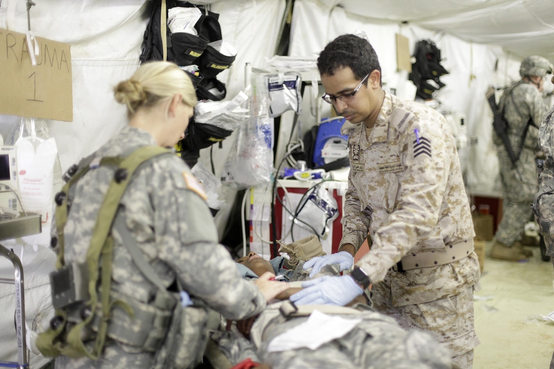 U.S. Army Reserve Soldiers train with multi-national forces for Combat Casualty Care at Forward Operating Base Justice on Fort McCoy, Wis. on August 18, 2016. Nearly 7,000 service members from across the country are participating in the 86th Training Division's Combat Support Training Exercise at Fort McCoy, Wis. More than 100 units from across the Army, the Air Force, the Navy, the Marines, and the Canadian Army are training at the 84th Training Command's final exercise of 2016. (U.S. Army Photo by Sgt. Tierney P. Curry/Released)