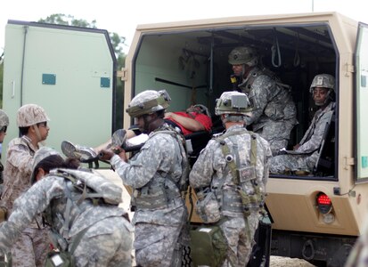 U.S. Army Reservists train with multi-national forces for Combat Casualty Care at Forward Operating Base Justice on Fort McCoy, Wis. on August 18, 2016. Nearly 7,000 service members from across the country are participating in the 86th Training Division's Combat Support Training Exercise at Fort McCoy, Wis. More than 100 units from across the Army, the Air Force, the Navy, the Marines, and the Canadian Army are training at the 84th Training Command's final exercise of 2016. (U.S. Army Photo by Sgt. Tierney P. Curry/Released)