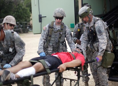 U.S. Army Reservists train with multi-national forces for Combat Casualty Care at Forward Operating Base Justice on Fort McCoy, Wis. on August 18, 2016. Nearly 7,000 service members from across the country are participating in the 86th Training Division's Combat Support Training Exercise at Fort McCoy, Wis. More than 100 units from across the Army, the Air Force, the Navy, the Marines, and the Canadian Army are training at the 84th Training Command's final exercise of 2016. (U.S. Army Photo by Sgt. Tierney P. Curry/Released)