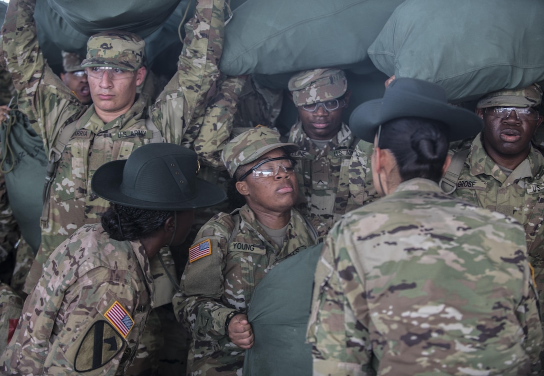 New Soldiers arriving for their first day of Basic Combat Training, Aug. 19, with Company F, 1st Battalion, 34th Infantry Regiment on Fort Jackson, S.C. are "welcomed" by drill sergeants from both the U.S. Army and U.S. Army Reserve. The reserve drill sergeants are from the 98th Training Division  (IET), 108th Training Command (Initial Entry Training) currently fulfilling their 29-day annual training commitment. (U.S. Army Reserve photo by Sgt. 1st Class Brian Hamilton/ released)