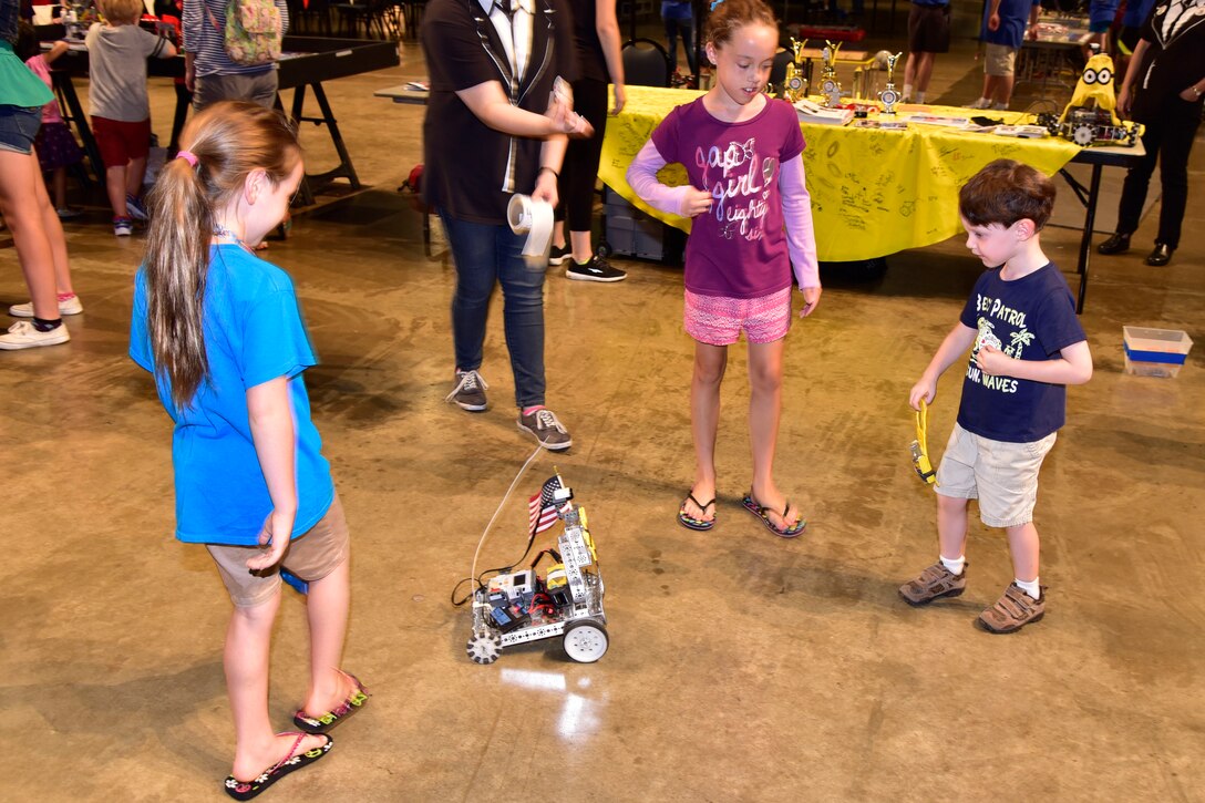 DAYTON, Ohio -- Youth participate in aerospace demonstration stations during Family Day on Aug. 20, 2016, at the National Museum of the U.S. Air Force. (U.S. Air Force photo) 