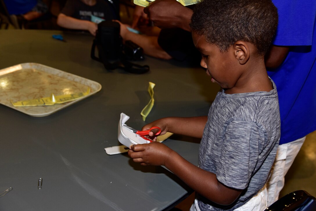 DAYTON, Ohio -- Youth participate in aerospace demonstration stations during Family Day on Aug. 20, 2016, at the National Museum of the U.S. Air Force. (U.S. Air Force photo) 