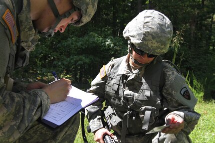 (right) US Army Reserve Spc. Valerie Fuentes, a mortuary affairs specialist and native of Buckeye, Arizona, and Pfc. Saul Castillo, a mortuary affairs specialist and native of San Bernardino, California, both with the 387th Quartermaster Company – Mortuary Affairs (MA), Los Angeles, California, inventory personal effects from a simulated human remains during a Mortuary Affairs Exercise (MAX) at Fort Pickett, Aug. 17. (US Army Reserve Photo by Sgt. Quentin Johnson, 211th MPAD/Released)