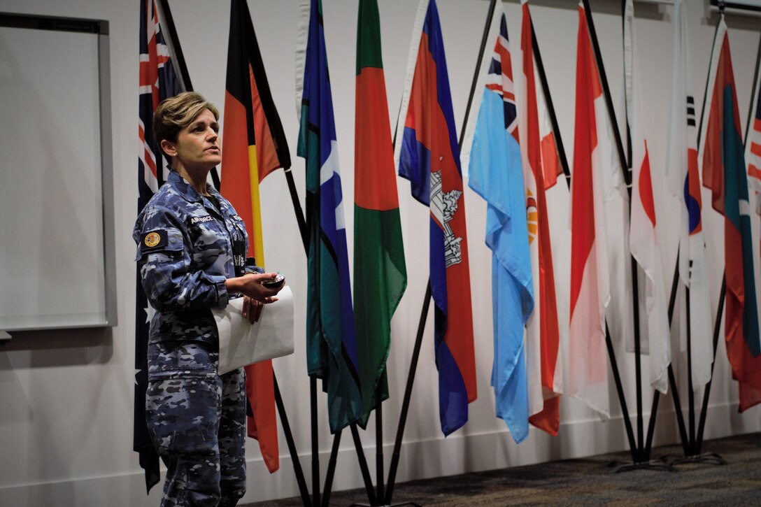 Royal Australian Air Force Warrant Officer Nicole Heffernan, co-host of Exercise Pacific Endeavor 2016, addresses participants during the exercise’s opening ceremony in Brisbane, Australia, Aug. 22, 2016. Sponsored by U.S. Pacific Command and hosted by the Australian Defense Force, Pacific Endeavor 2016 is a multinational workshop designed to enhance communication interoperability and expedite humanitarian assistance and disaster relief response in the Indo-Asia-Pacific region. DoD photo by Air Force Master Sgt. Todd Kabalan
