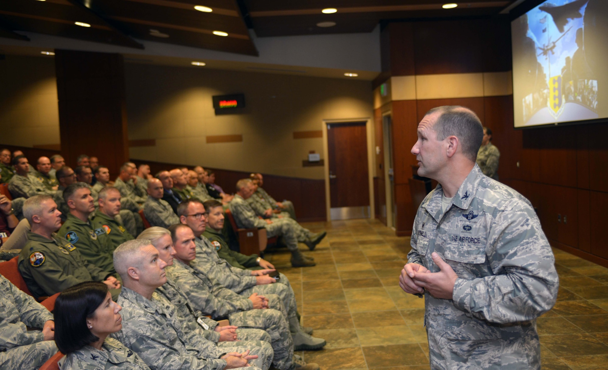 Col. Gentry Boswell, 28th Bomb Wing commander, provides opening remarks to inspection team members at the unit mission briefing at Ellsworth Air Force Base, S.D., Aug. 21, 2016. During a Unit Effectiveness Inspection, inspectors validate and verify a wing commander's Inspection Program for accuracy, adequacy and relevance, and provide an independent assessment of the Wing’s ability to execute the mission. (U.S. Air Force photo by Airman 1st Class Donald C. Knechtel/Released)