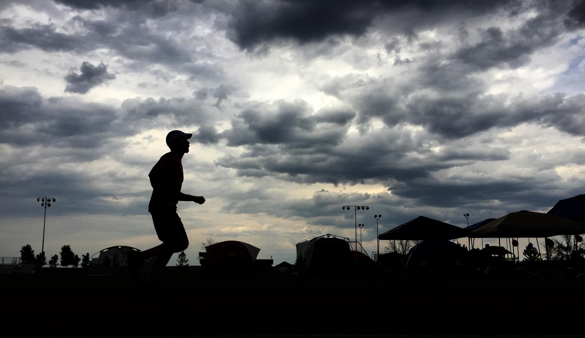 Eleven teams participate in Schriever Challenge at Schriever Air Force Base, Colorado, Aug. 18-19, 2016. The event challenged Team Schriever to complete a 24-hour run and walk relay with the hopes of raising funds for the Rocky Mountain Fisher House. (U.S. Air Force photo/Tech. Sgt. Julius Delos Reyes)