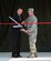 Col. David Gaedecke, 552nd Air Control Wing commander, and Rich Sykes, Mayor of Mountain Home, Idaho cut the ribbon at the 726th Air Control Squadron ribbon cutting ceremony for their new compound August 18, 2016, at Mountain Home Air Force Base, Idaho. The new equipment will allow the 726th ACS to train the way they fight by providing identical equipment to what they deploy with. (U.S. Air Force photo by Airman Alaysia Berry/Released)