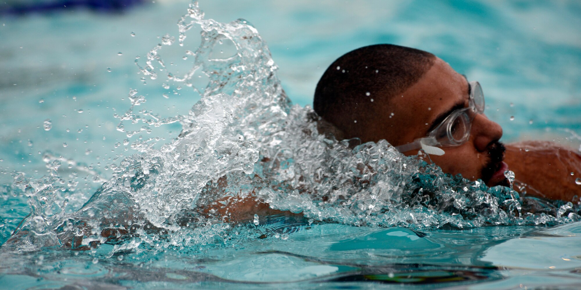 A participant completed a 400-meter swim in the Sliver Wings pool during the first portion of the Luke Air Force Base triathlon Aug. 20, 2016 at Luke Air Force Base, Ariz. The triathlon consisted of three events, each timed by personal cycling event promotion timers strapped to the ankle of each competitor. (U.S. Air Force photo by Senior Airman Devante Williams)