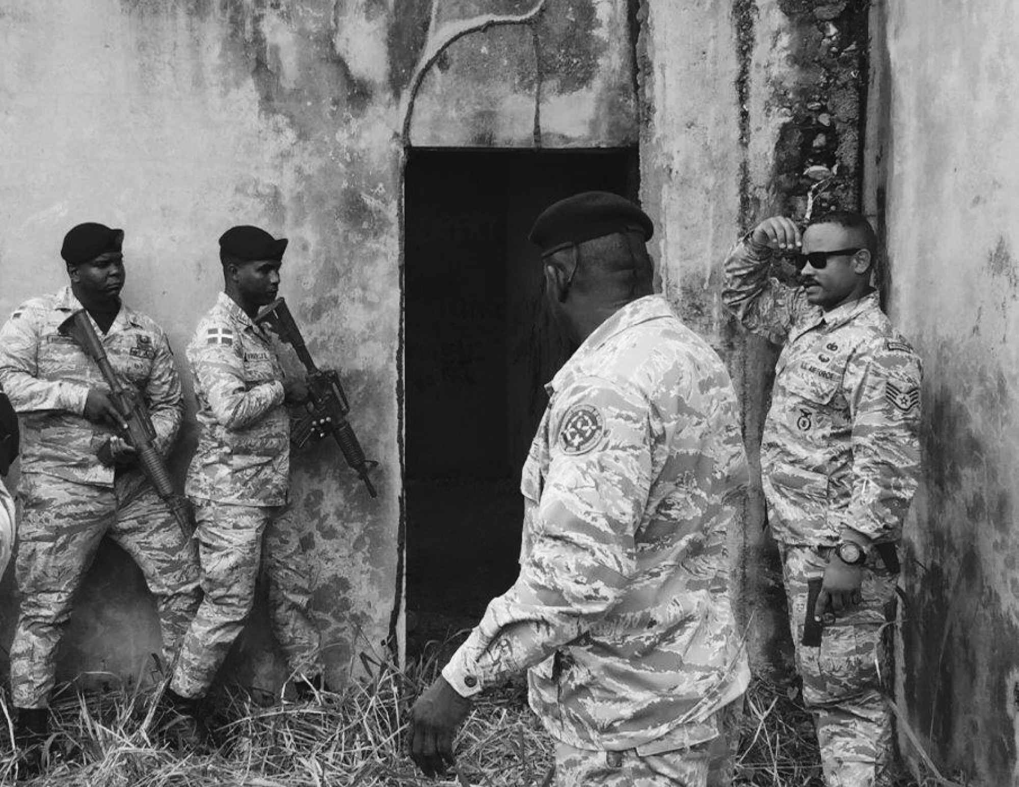 U.S. Air Force Staff Sgt. Angel Moquete, 571st Mobility Support Advisory Squadron air advisor, teaches members of the Dominican Republic Air Force different types of tactics. The MSAS training team taught security forces tactics such as, close quarters training, team movements and inter team communication, proper searching and handcuffing procedures and de-escalation procedures. (Courtesy Photo)