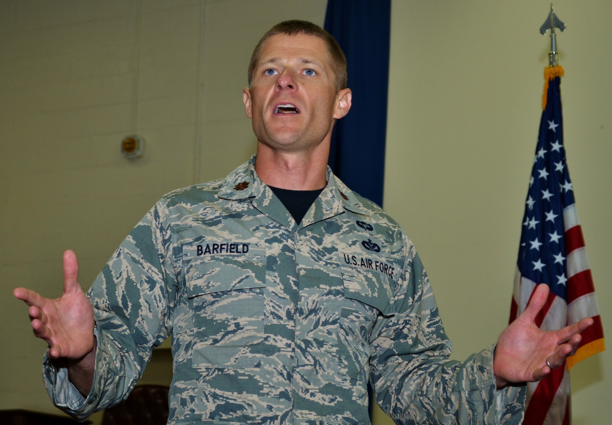 Maj. Oliver Barfield, 201st Rapid Engineer Deployable Heavy Operational Repair Squadron Engineers (RED HORSE) Squadron, Det. 1 commander, addresses his squadron during his assumption of command held at Horsham Air Guard Station, Pa., Aug. 13, 2016. Maj. Oliver Barfield, a 2001 Air Force Academy graduate, received the guidon from Col. Michael Regan, 111th Mission Support Group commander, signifying Barfield taking the helm of The Horse. (U.S. Air National Guard photo by Tech. Sgt. Andria Allmond)