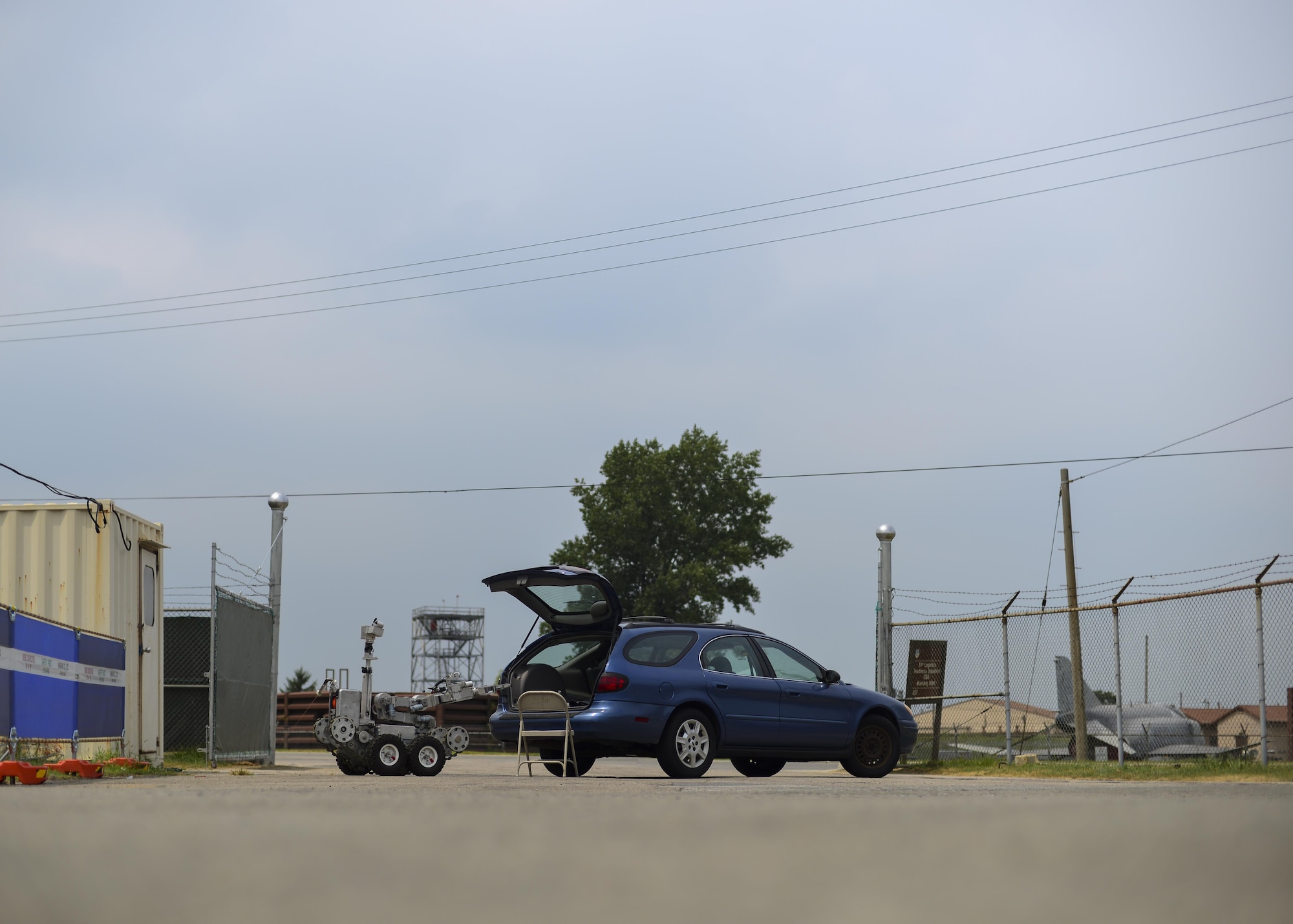 An Andros F6 robot approaches an improvised explosive device in the back of a vehicle at Osan Air Base, Republic of Korea, Aug. 23, 2016. The 51st Civil Engineer squadron explosive ordnance team responded to reports of a suspicious vehicle during Exercise Beverly Herd 16-2. (U.S. Air Force photo by Senior Airman Victor J. Caputo)