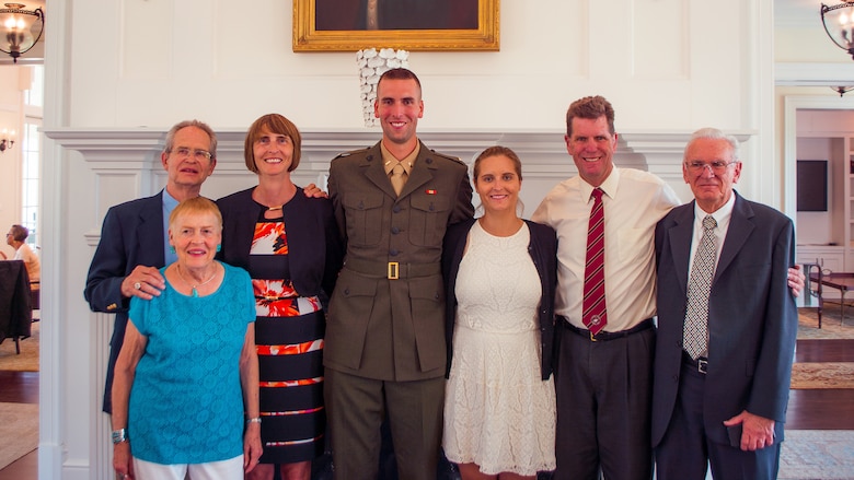 Second Lieutenant Trevor Weaser celebrates with family after his commissioning ceremony aboard Marine Corps Base Quantico, Va., August 7th, 2016. The mission of Officer Candidate School is to educate and train officer candidates in order to evaluate and screen individuals for qualities required for commissioning as a Marine Corps officer.