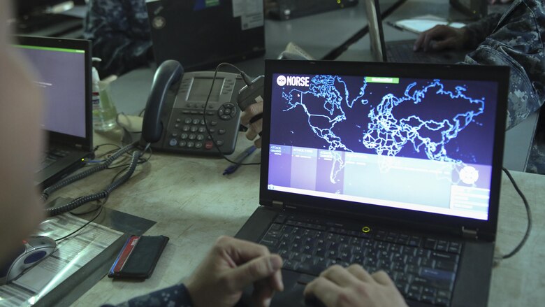 A sailor with 553 Cyber Protection Team opens a network monitoring program during I Marine Expeditionary Force Large Scale Exercise 2016 at Marine Corps Air Station Miramar, Calif., Aug 22, 2016. The overall purpose of the exercise was to practice the deployment of a fighting force of more than 50,000 military personnel to a partner nation and incorporate both live-fire and simulated combat scenarios against a near-peer enemy force. 553-CPT is a team of cyber defense specialists with Fleet Cyber Command. The team advised I MEF while setting up the command element’s networks.
