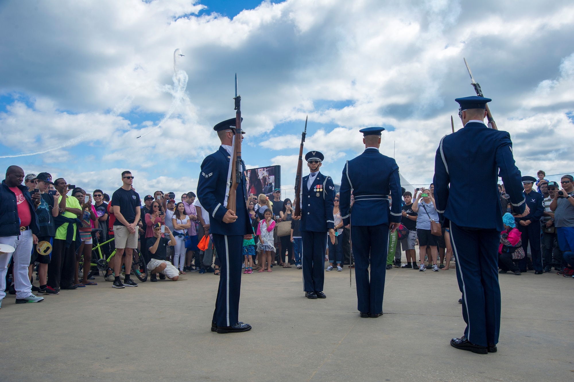 Members of the U.S. Air Force Honor Guard Drill Team perform a four-man routine during the 58th Annual Chicago Air and Water Show on the shoreline of Lake Michigan in Chicago, Ill., Aug. 21, 2016. The show’s headliners were the USAF Thunderbirds, U.S. Army Golden Knights and the U.S. Navy Leap Frogs. (U.S. Air Force photo by Senior Airman Ryan J. Sonnier)