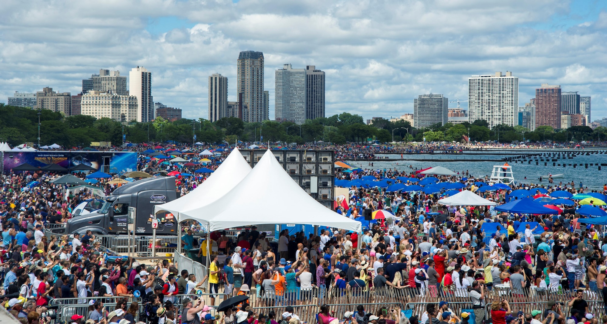 A crowd fills the shoreline of Lake Michigan during the 58th Annual Chicago Air and Water Show in Chicago, Aug. 21, 2016. The show’s headliners were the USAF Thunderbirds, U.S. Army Golden Knights and the U.S. Navy Leap Frogs. (U.S. Air Force photo by Senior Airman Ryan J. Sonnier)